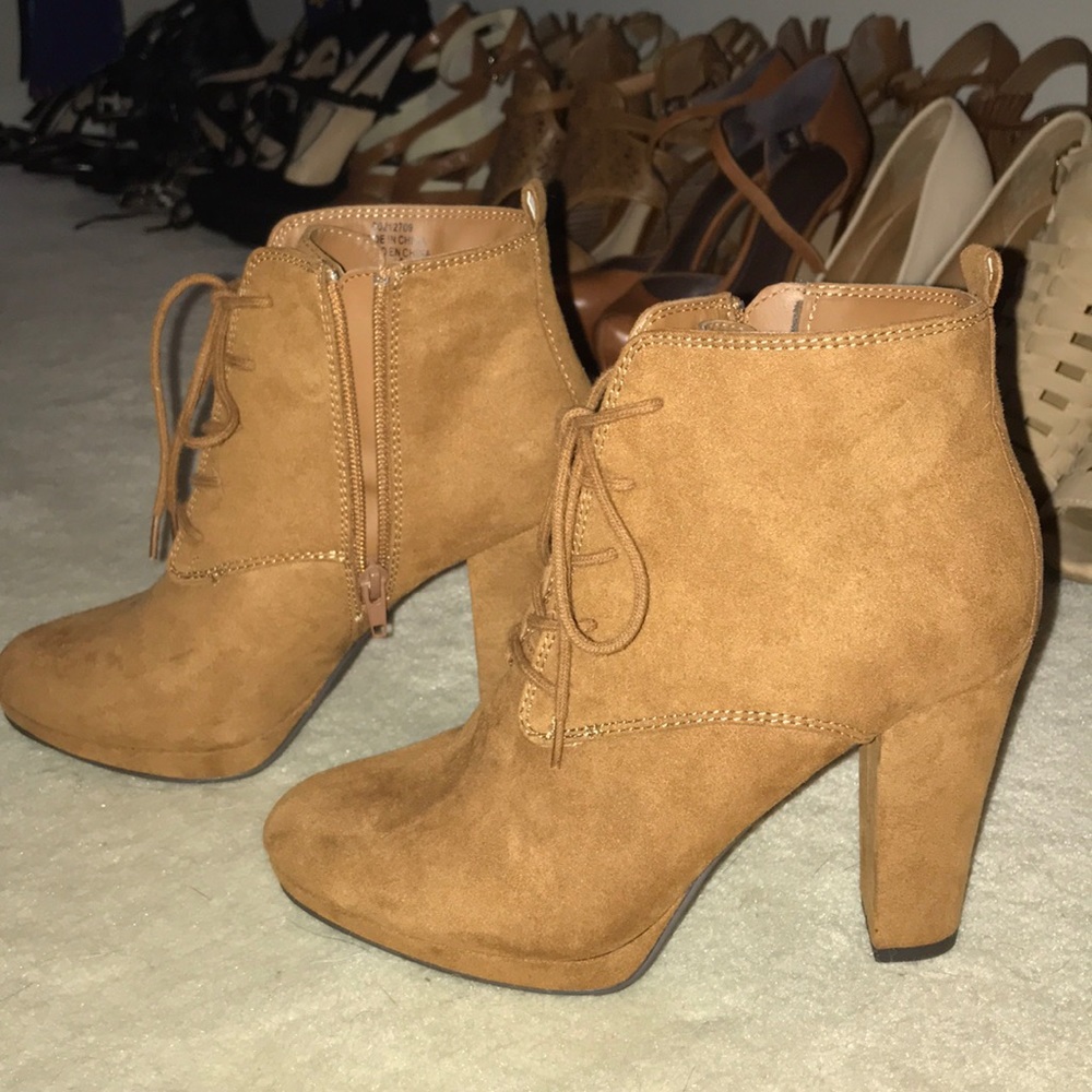 light brown lace up booties. Size 7!